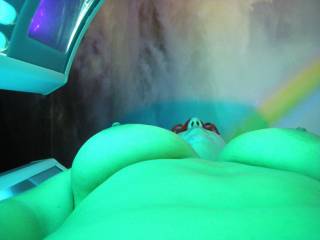 a shot of my titties in the tanning bed