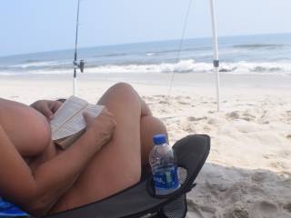 Doing some reading on the beach.