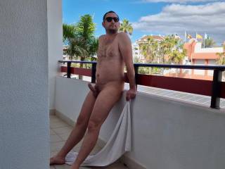 Naked on the hotel balcony