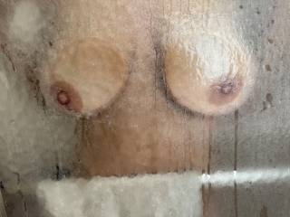 Love when she presses her big, natural tits against the shower doors, only problem is I can\'t lick them through the glass