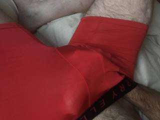 Tight red boxers show of the bulge