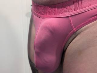 Teasing in a pink thong