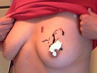 C,-" A little bit of chocolate topping and whip cream nipple  for a taste