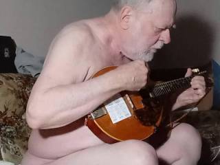I decided to play the mandolin while singing naked