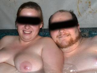 hubby with new friend in hot tub