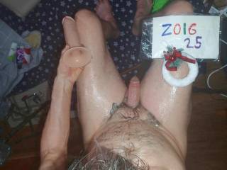 An above partial body view of my dick and colored lube on my skin after the toy play sitting on a bar stool.TG1 camera was used.