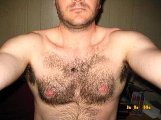Oh good heavens...a hairy chest and fine nipples. Love it.