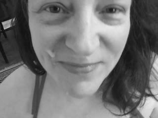 How does my first facial look in black and white? Hubby thinks more white is needed in the photo. I think my man's cum looks really good in monochrome.