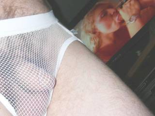 Standing wearing mesh undie with adult movie on TV in July of 2021...pic taken with coolpix s4.