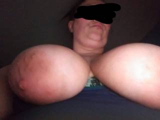 Sluts big titties. Who wants to cum on them?