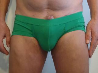 Showing off in green panties