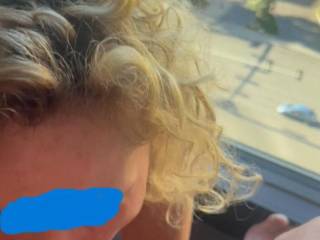 A very fun coworker - during a lunch break at a week long company sales meeting.  Why is it so fun to play at the hotel windows???  Do you want to come work at our company?