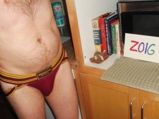 A frontal of me wearing my undie as I stand near my microwave where I have some old books...Sony 150 camera was used.