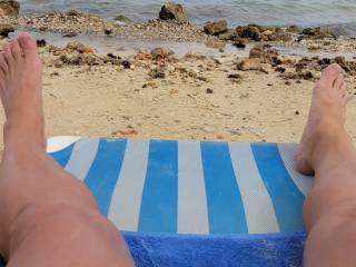 Laying on a beach in Jamaica