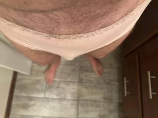 My dick was looking rather small and limp one day, so I decided to put on a pair of my wife’s pink panties to further add to my humiliation.  Looking down at my little dick in panties, felt emasculating but also a bit erotic as well.