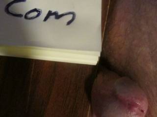 An above close up of my open slit with fluid flowing down as I get hard...