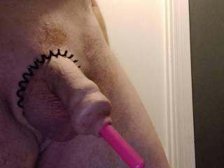 A Side View of My Cock, Balls, with My Small Toy Stretching My Foreskin....I Hope Your Enjoying The View