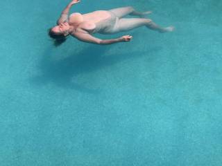 This is one of my favorite friends floating in the pool Without her swimming suit