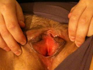 My ex's pussy spread open.  Look how pink it is