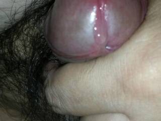 Precum leaking out from my small hard cock.