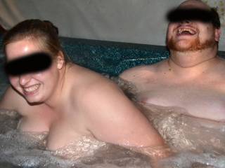hubby and new friend having fun in the hot tub :)