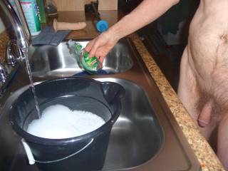 A frontal as I stand near the kitchen sink... a pail with dish soap in it...  late April of 2025. A Z4 camera was used.