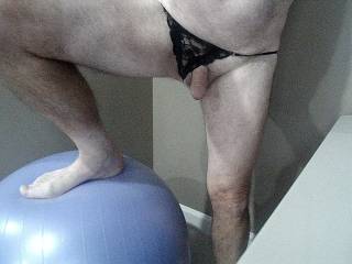 It was fun using the exercise ball wearing her black thong :)