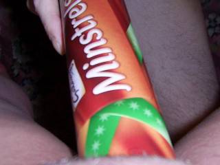 Hubby rubbing my clit with a minstrel tube ..hmmmm feels so good ...