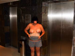 Elevators going up and my top coming down...titties out in the hotel lobby!