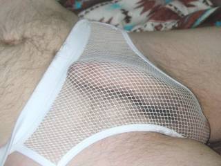 On my bed having an erection,while wearing the mesh undie in July of 2021...pic taken with coolpix s4.