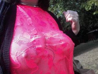 Walking across the public car park in her \'Flamingo\' dress. It is blatantly sheer as you can see!
