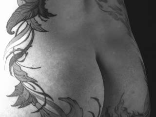 Some details of her butt tatts. A friend of mine wanted me to photograph his tattooed lady. How could I say no.