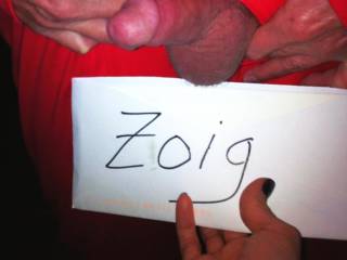 here is my wife holding Zoig under my balls