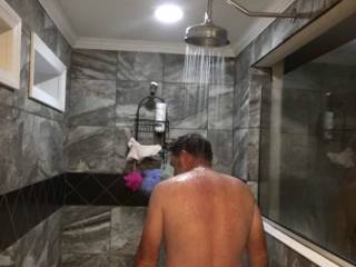 Enjoying a hot shower.