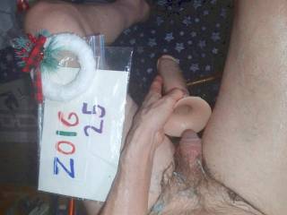 An above view as I sit on a bar stool with leftover colored lube on my skin... my dick is waiting to re-enter the toy...TG1 camera was used.