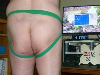 A standing view of my butt, since I am wearing a bottomless undie that the straps are visible...and standing near my 5 out 6 PC`s...A game from 1997 is on the monitor... AGNS... me vs PC- a Navy game...