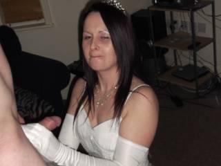 on her knees as  a slut bride should be for the best man:)