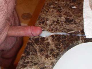 Weekend getaway at a luxury resort.  Hubby jacking off his cock and spraying his cum on the bathroom sink while I watch and masturbate in the bathtub!  I love when he puts on a show for me!