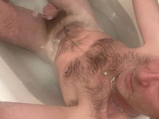 Hairy man in bath