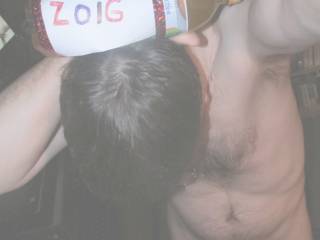 Looking down at my self fully nude:)With the beverage on my head & neck.