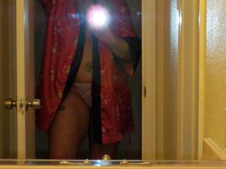 relaxing in my pink striped panties and my robe...  wouldn\'t you love to cum up behind me and bend me over the counter?