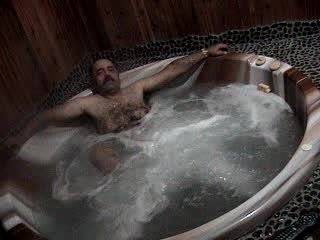 in hot tubb having funn