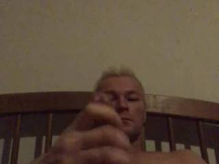 Masturbating