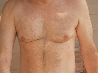 Nude on my suburban patio.