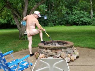 cleaning the fire pit . Stayin naked while weather is nice.