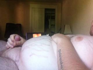 Jerking it and getting off to my own fat body. 

I literally cum so much to my own growing body.