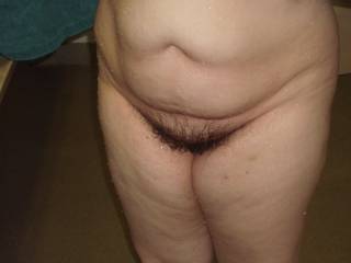 My wife\'s wet pussy in the middle of the men\'s room after a shower