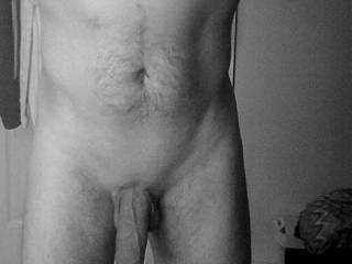 Hubby in the mirror showing his nipple piercing,I think he looks good but then i'm biased.What do you ladies think?