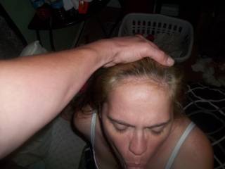 she is receiving her reward. straight down the throat.
