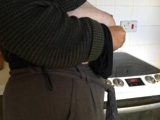 2 of 2 - leaning. In the kitchen, tits out. having a quick look to see who just walked through the front door ...